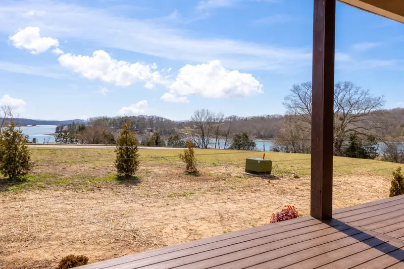Shiloh Project: view from the covered porch across the lot toward water and trees